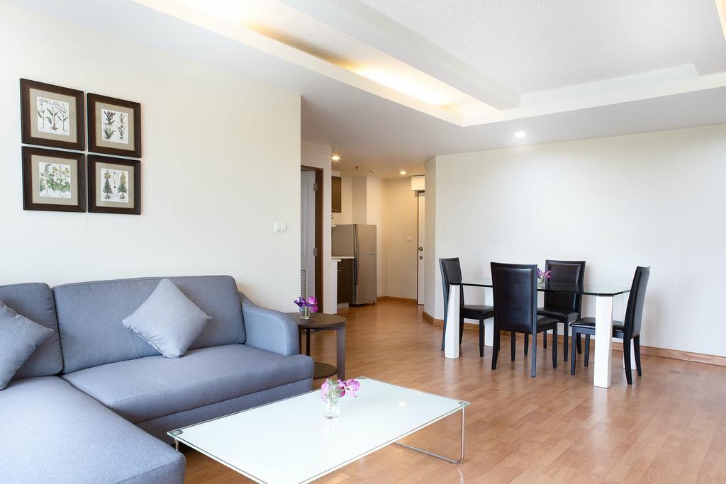 The Capital Resort @ Sukhumvit 50 Bangkok Exteriör bild A living room in a serviced apartment in Bangkok, Thailand